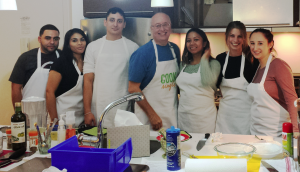 Dan Dolgin (center) with one of his classes at CookSingle.