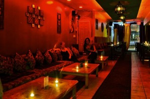Patrons sit inside Fayrooz Hookah Lounge and Bar, which was one of two Astoria hookah lounges discovered serving tobacco in its shisha.